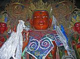 Tibet 06 09 Gyantse Kumbum Maitreya This brown statue in the Gyantse Kumbum is Maitreya, the future Buddha. Just as Christians await the coming of Christ, Buddhists throughout the world await the coming of Buddha Maitreya. He is prophesied to become the fifth universal teacher of this world era. His deeds will usher in a golden age on earth, and bring an end to the culture of war, violence, intolerance, and hatred that characterizes the present time in human history.